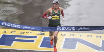 Japan hails school clerk who won Boston Marathon