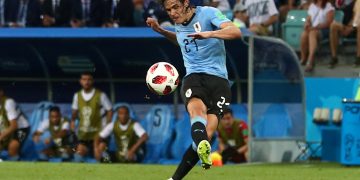 Brilliant Cavani brace fires Uruguay into last eight