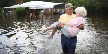 U.S. report says climate change will batter economy, in clash with Trump