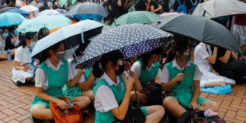 Hong Kong students rally peacefully after weekend violence