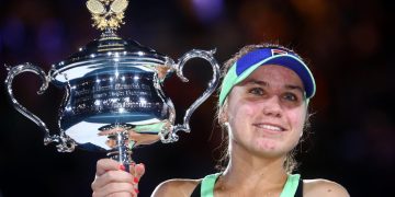 Comeback kid Kenin overpowers Muguruza to claim first major