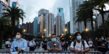 Defying police ban, Hong Kongers hold Tiananmen candle memorial