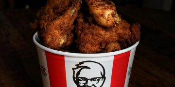 KFC tells customers to hold off on the ‘Finger Lickin’ for now