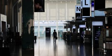 Japan’s travel ban to contain virus unfair, western businesses say