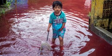 Indonesian village turns red as floods hit batik-manufacturing hub