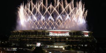 With muted ceremony and empty stadium, Tokyo Olympics begin