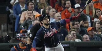 Rookie propels Astros past Braves to tie Series