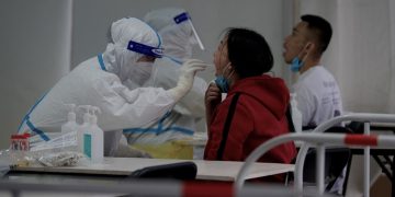 Beijing enforces lockdowns, expands COVID-19 mass testing