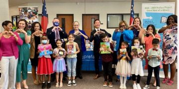 Preface donates over 200 books and healthcare materials to Graves Elementary School