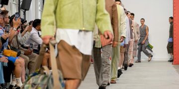 Layering, statement denim hit Paris Fashion Week