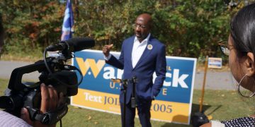 Senator Warnock celebrates First Day Voting at Walk The Polls Rally in Duluth