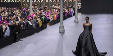 Glitzy Valentino show sees Paris Fashion Week at fever pitch