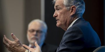 Federal Reserve raises its key rate for 11th time by a quarter-point in its drive to slow inflation