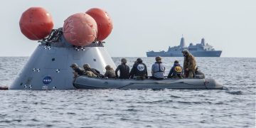 NASA Orion capsule safely blazes back from moon, aces test