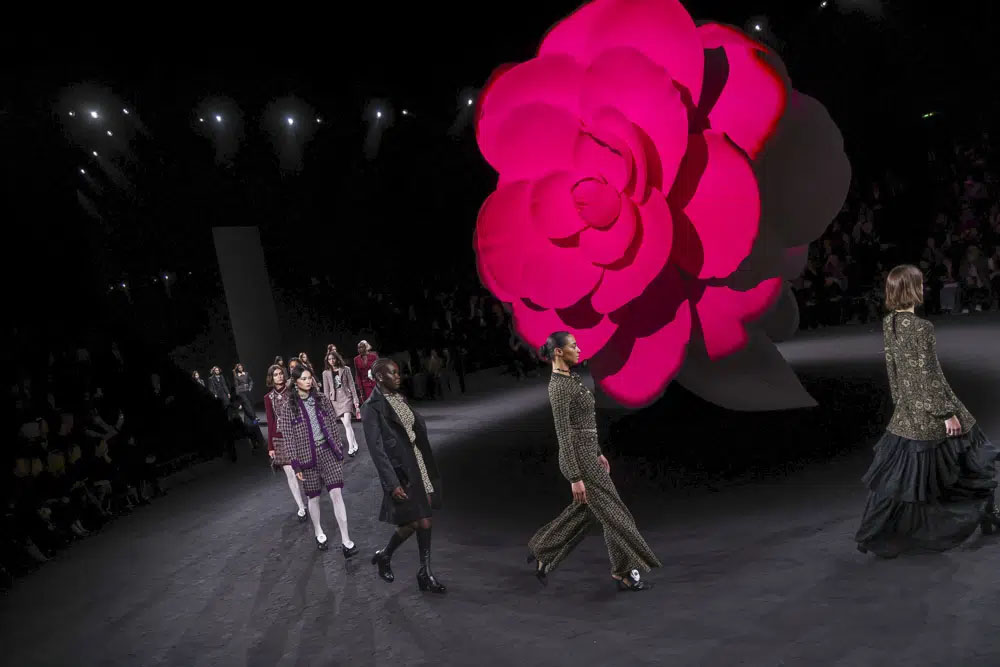 Chanel's camellias, empty chairs close Paris Fashion Week - Georgia Asian  Times