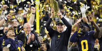 Michigan overpowers Washington 34-13 as Jim Harbaugh delivers a national title