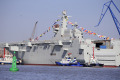 China launches amphibious assault ship that can launch fighter jets