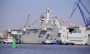 China launches amphibious assault ship that can launch fighter jets