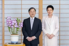 Japan’s emperor marks his 65th birthday with a call to keep telling the tragedy of WWII to the young