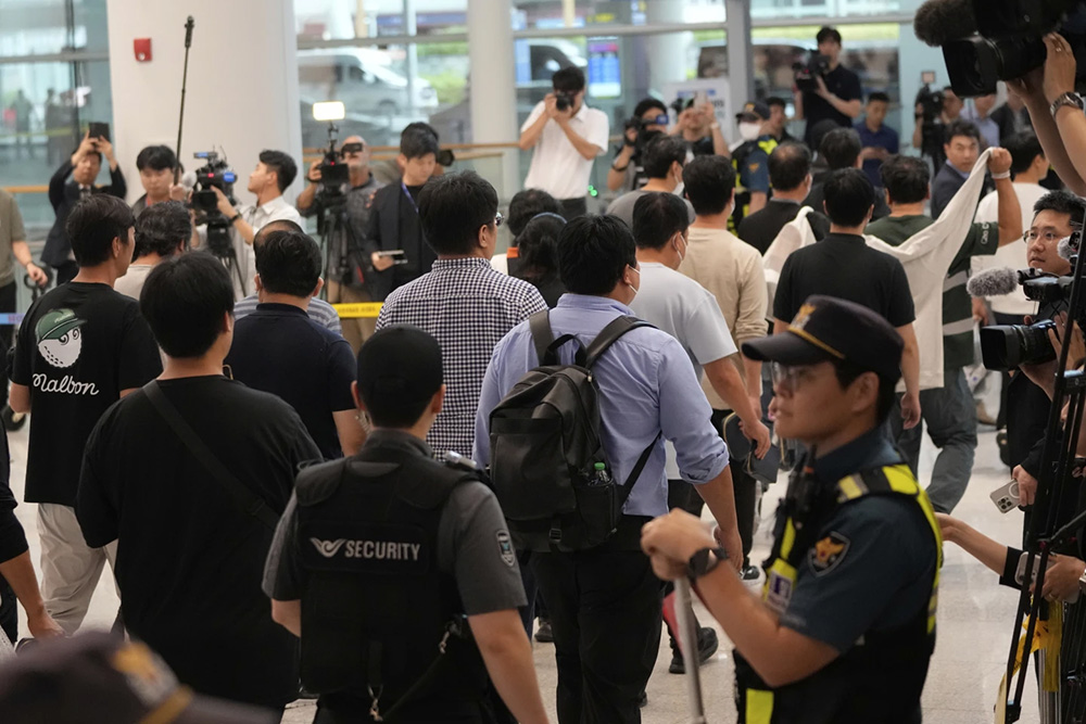 South Korean workers return home after days of detention in Georgia ...