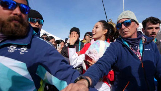 Eileen Gu in tears after defending her Olympic halfpipe title, learning of her grandmother’s death