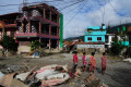 Catastrophic floods kill over 353 in Nepal and Tibet, with more than 1,300 missing