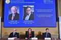 2 American economists win Nobel for work on managing economic shocks