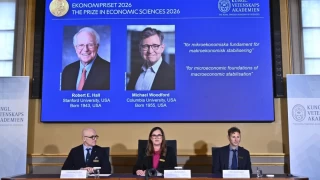 2 American economists win Nobel for work on managing economic shocks
