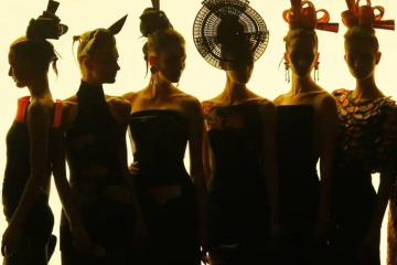 FILE - Models wear creations for the Giorgio Armani Fall-Winter 2011-2012 Haute Couture fashion collection presented in Paris, July 5, 2011. (AP Photo/Jacques Brinon, file)
