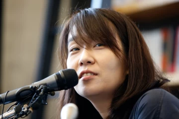 Photo: South Korean author Han Kang speaks to the media during a news conference in Seoul, South Korea, on May 24, 2016. (AP Photo/Lee Jin-man, File)