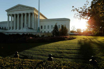 A general view of the U.S. Supreme Court building at sunrise is seen in Washington October 5, 2014.    REUTERS/Jonathan Ernst
